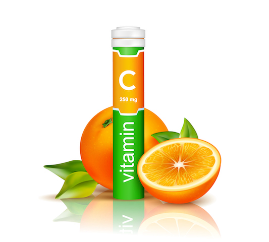 vitamin c tablets with oranges.