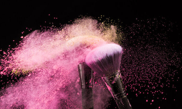 pink makeup on brushes.