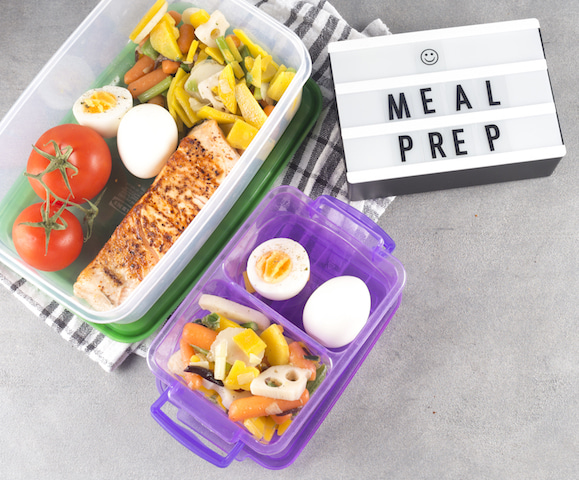 tupperware containers full of food for meal prep.